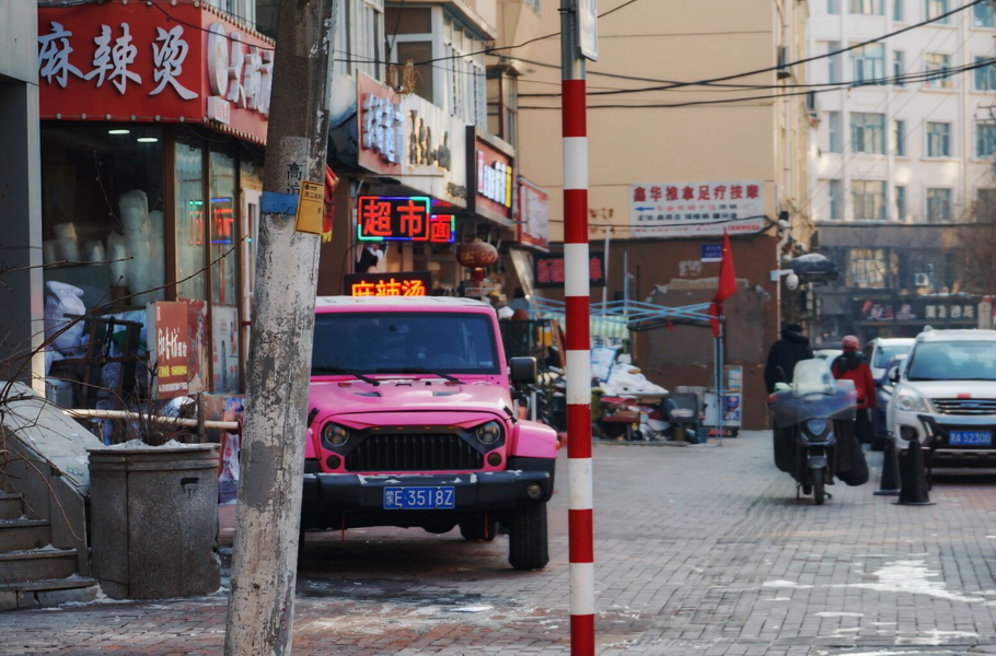 Vibrant Chinese Street with Commercial Establishments