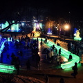 Harbin Ice Festival Nighttime Scene with Colorful Lights and People