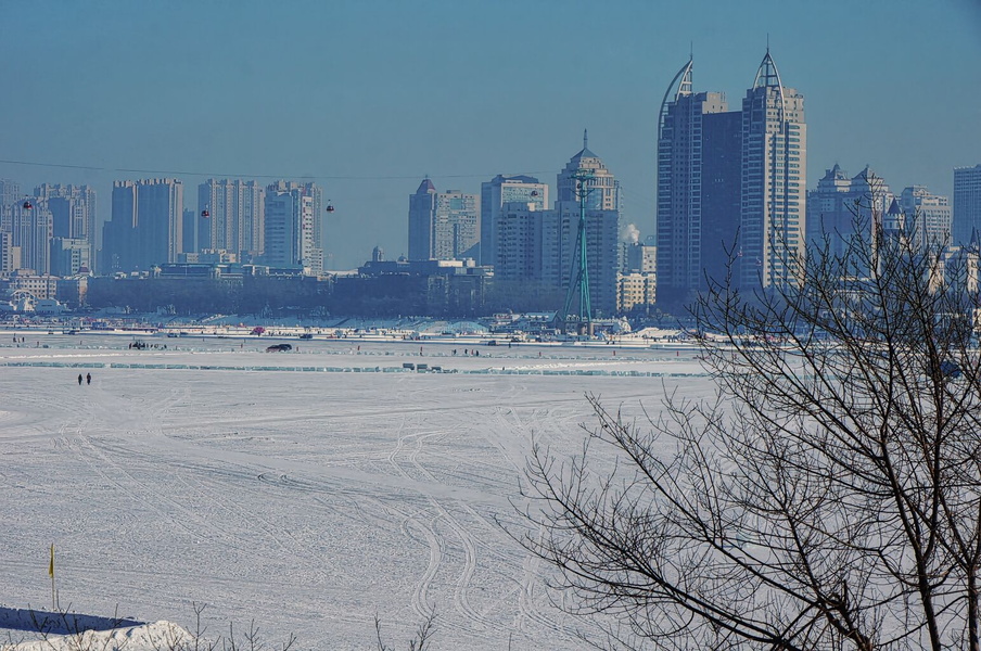 Frozen River in Harbin, China - A Winter Day Cityscape