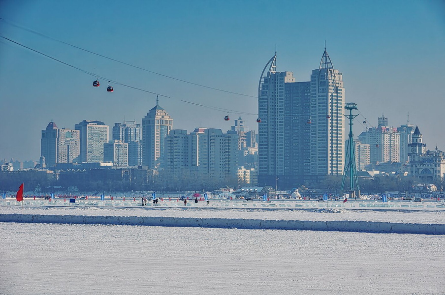 Frozen Cityscape: A View of Harbin from the River