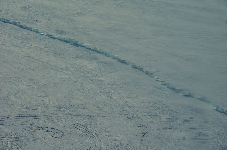 Aerial View of Harbin, China: Winter Cityscape and Ice Formations
