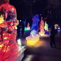 Vibrant Ice Sculptures Illuminated at Night in a Winter Festival