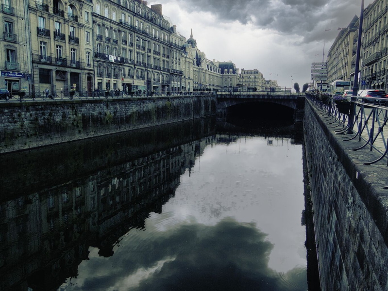 Serene Rennes: A Reflective Canal Walk