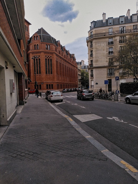 Quiet Parisian Street Near a Gothic Church