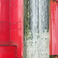 The Elegant Flow: A Red Fountain in Paris