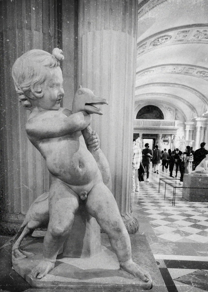 The Charming Child's Statue in a Parisian Art Gallery