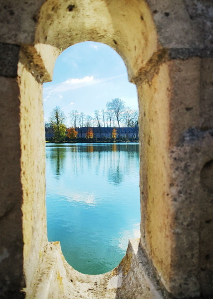 Serene View through Arched Window