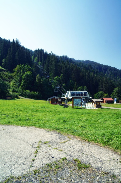 Serene Mountain Bus Stop Under a Clear Blue Sky