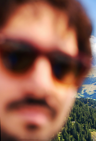Explorer's Moment: A Traveler Captures His Adventure in the French Alps