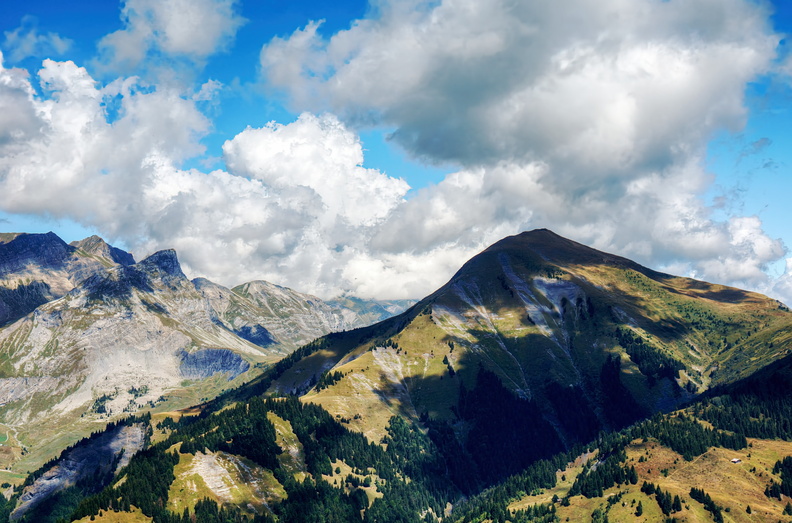 Serene Alpine Valley with Majestic Mountains and Clear Sky