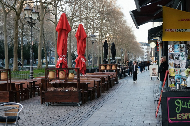Elevated Street View with Outdoor Dining and Brick Paving in Cologne, Germany