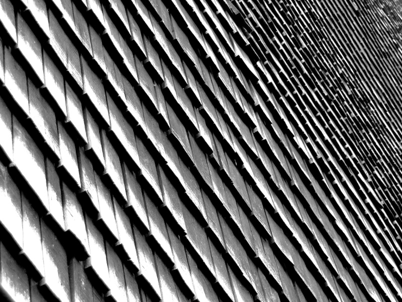 Contemporary Architectural Facade with Patterned Window Shields