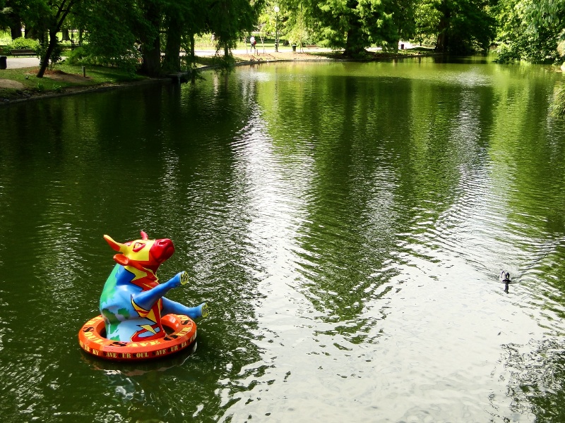 Vivid Lake Scene with a Colorful Dragon Statue