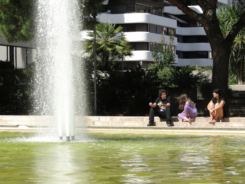A Family Enjoying a Day at the Museum Fountain