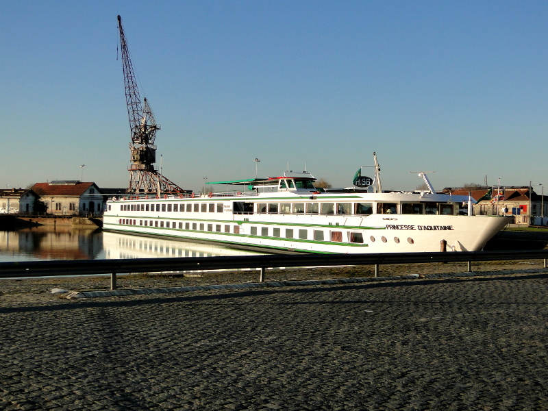 River Cruise Boat Docked at a City Harbor